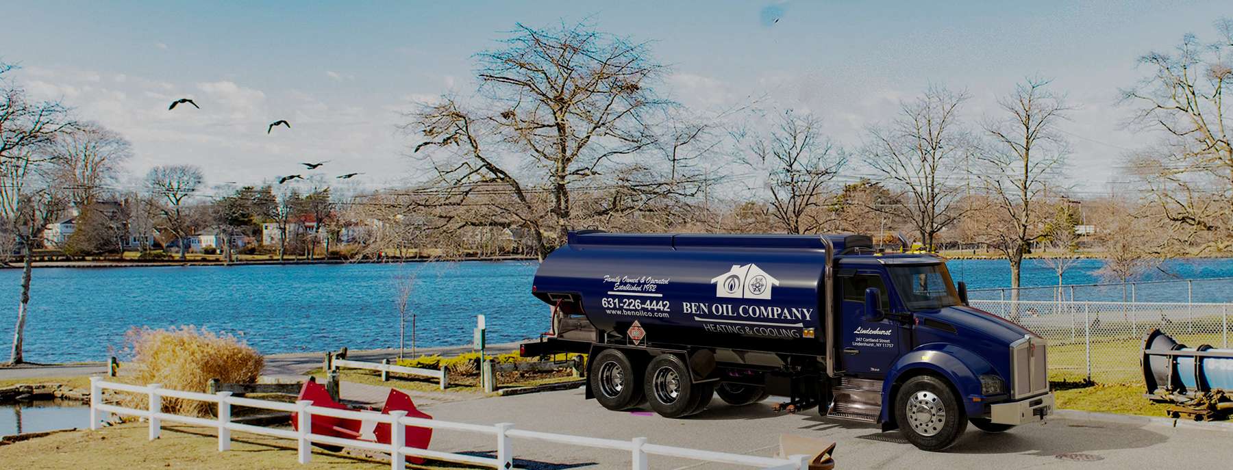 Ben Oil Heating Oil Truck Ben Oil residential home heating oil truck in a recreational area with bike racks and snow plows in Lindenhurst, Long Island, New York delivering fuel oil.